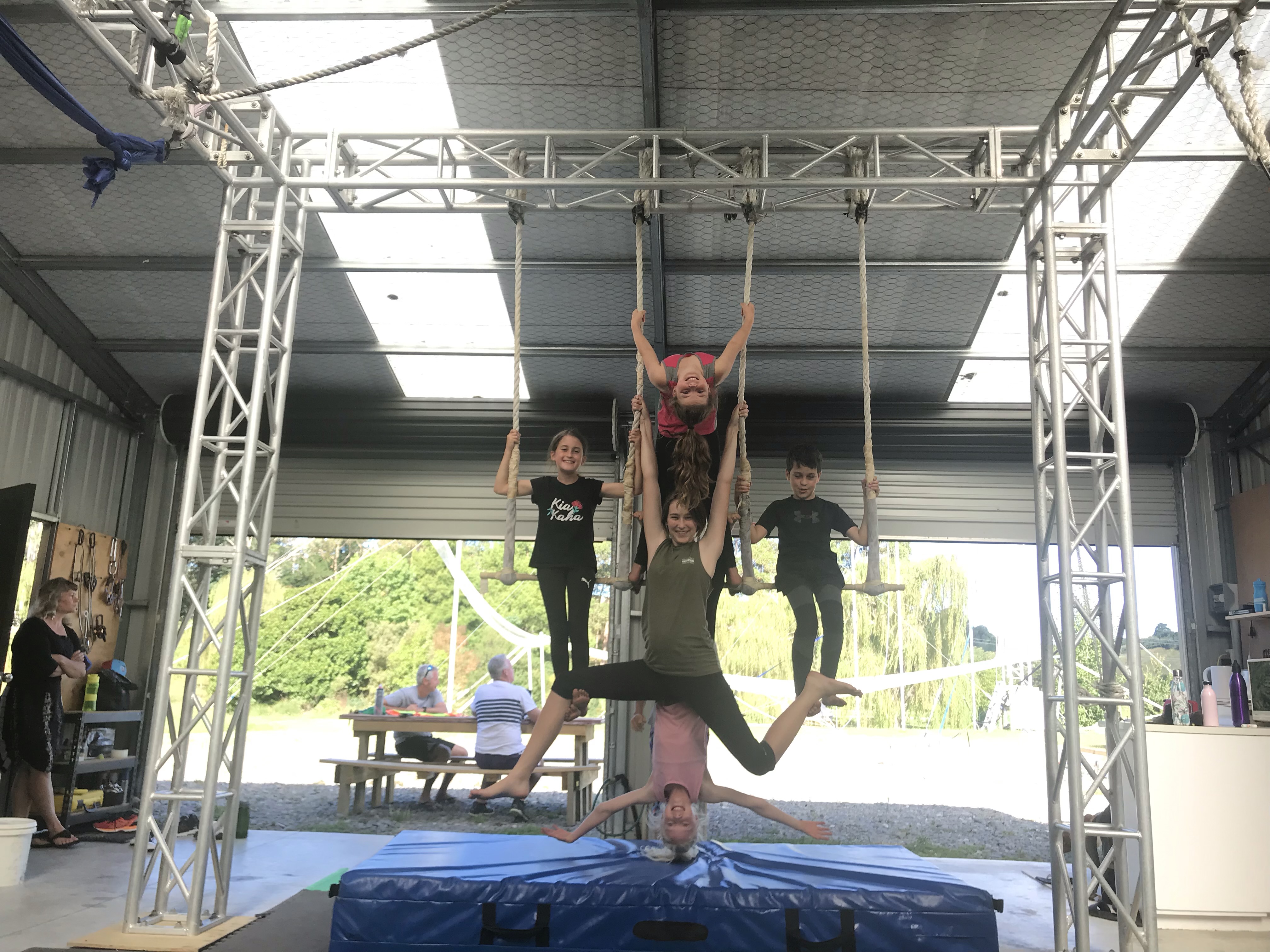 Kids on aerial apparatus during holiday program
